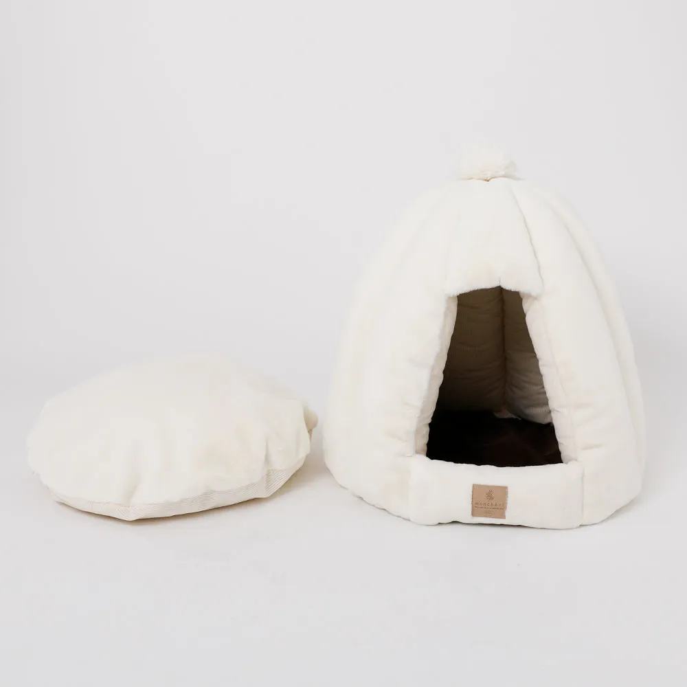 white fur dome bed with plush cushion